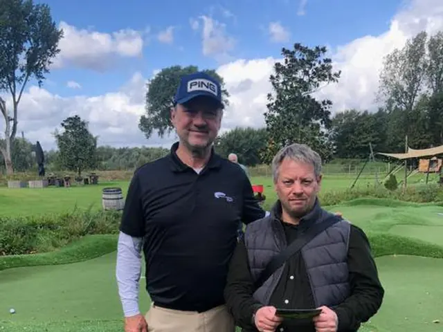 Golf instructor and participant on the putting green during the inclusive golf event