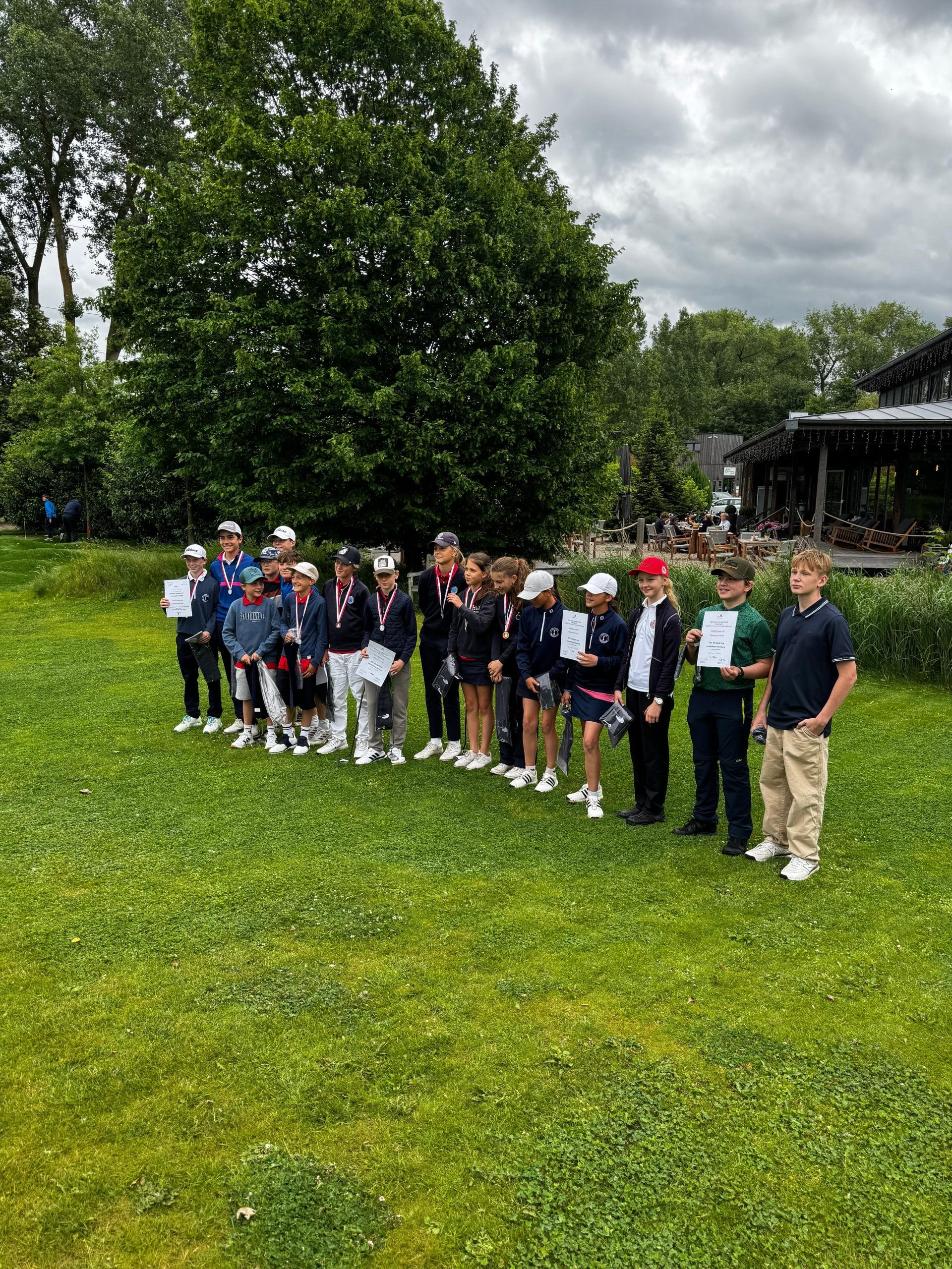 Young golfers on the fairway
