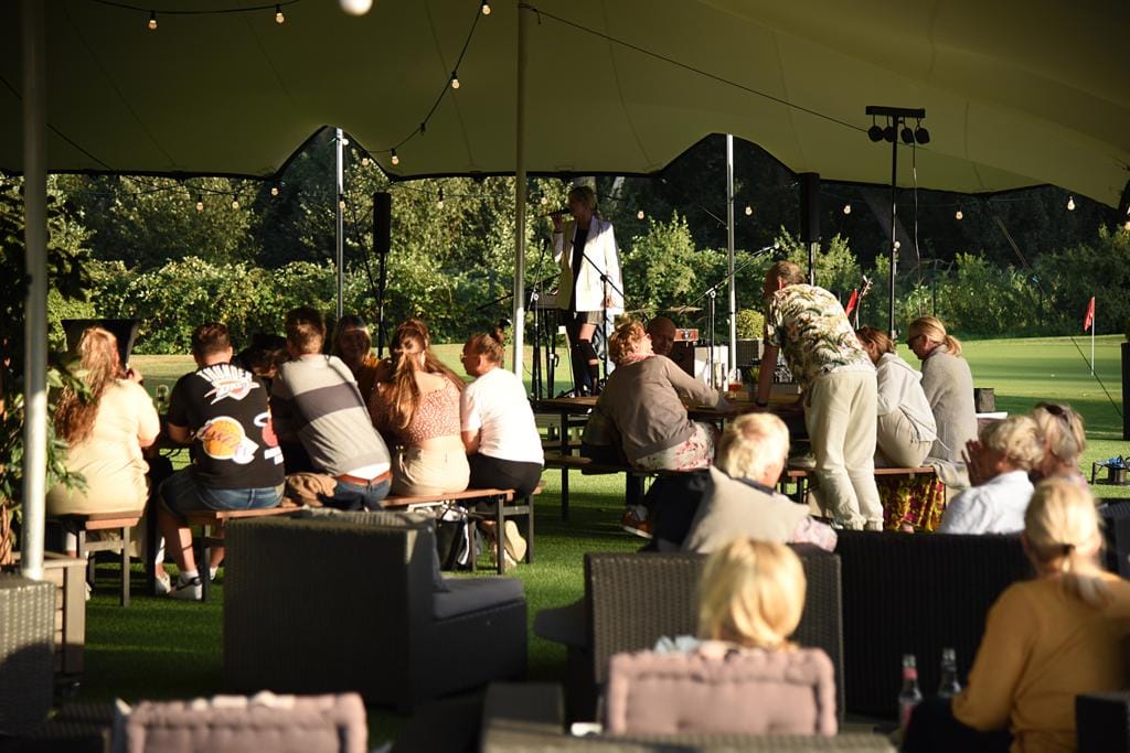 Guests enjoying the summer evening