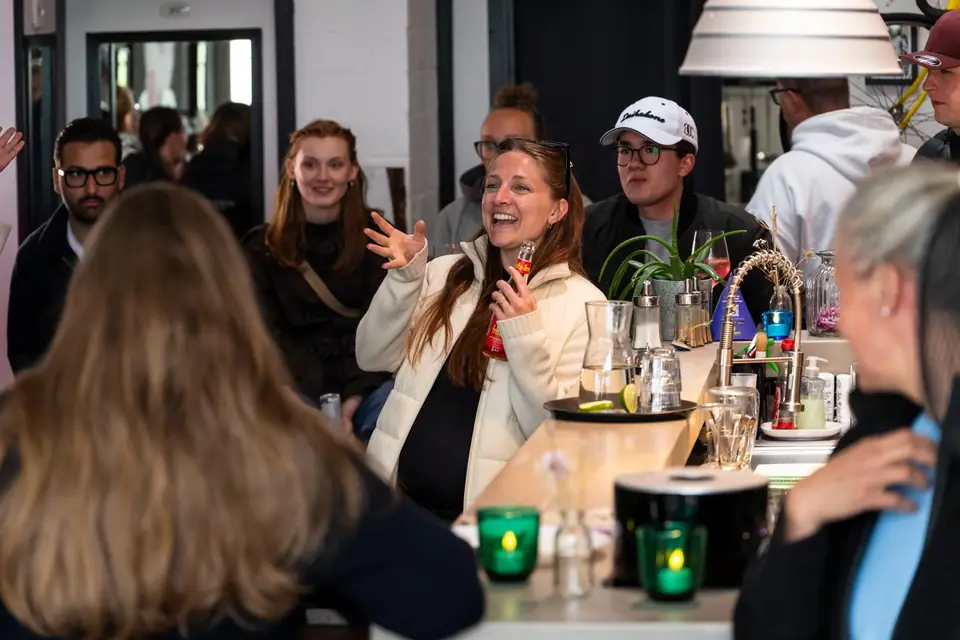 Guests chatting inside the watersports station