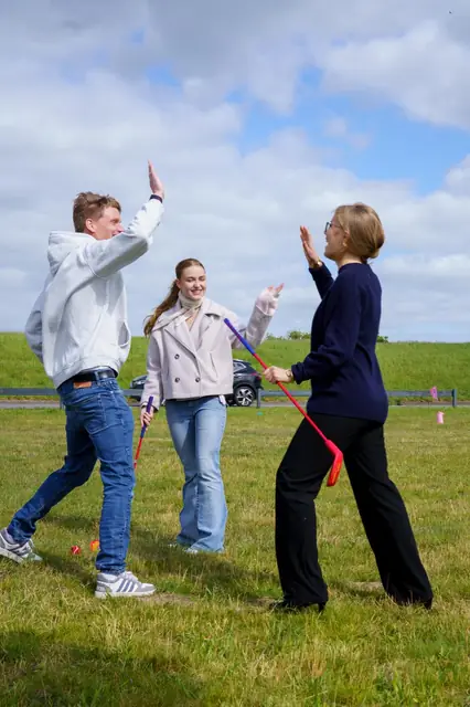 High five during the golf game on the dike meadow