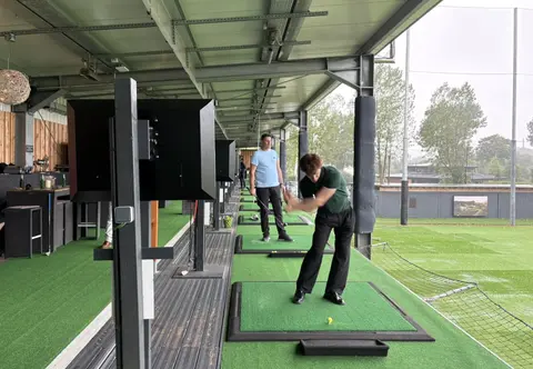 Hotel Böttcherhof team challenge during the summer party on the covered driving range at Golf Lounge